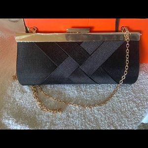 black and gold clutch